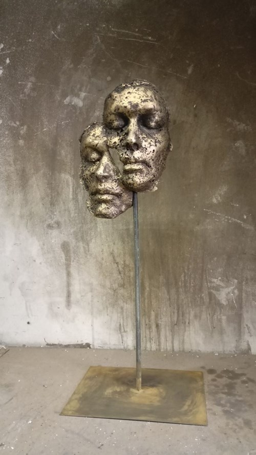 Living room sculpture by Dariusz Madejski titled Faces