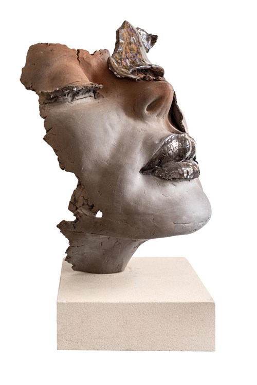 Living room sculpture by Jacek Opała titled Spotted head