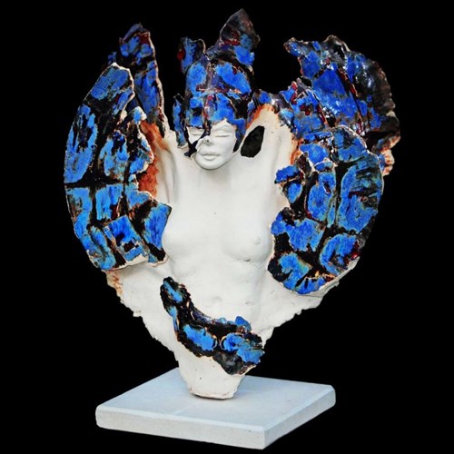 Rzeźba do salonu artysty Jacek Opała pod tytułem Przemiana motyla 1