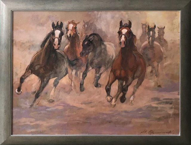 Living room painting by Stanisław Chomiczewski titled Horses at a gallop