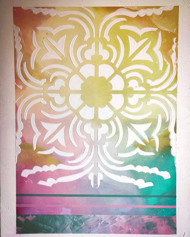 Living room painting by Ewelina Grabowska titled Rainbow mandala