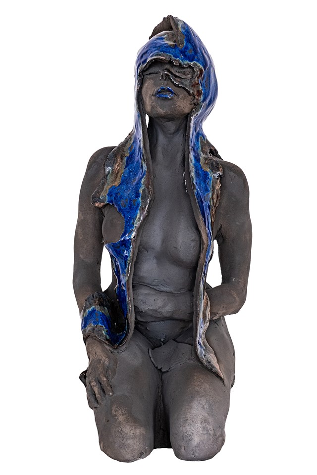 Living room sculpture by Jacek Opała titled Nude with the blue ribbon