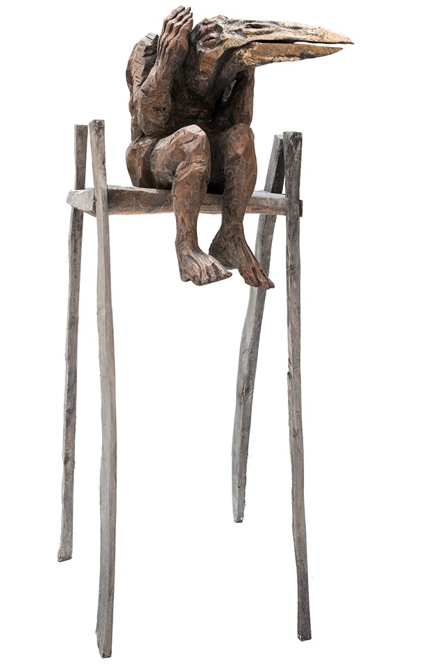 Living room sculpture by Marcin Myśliwiec titled The flightless in high chair